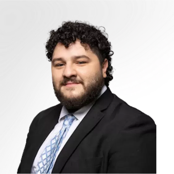 Retrato de hombre con traje y corbata azul